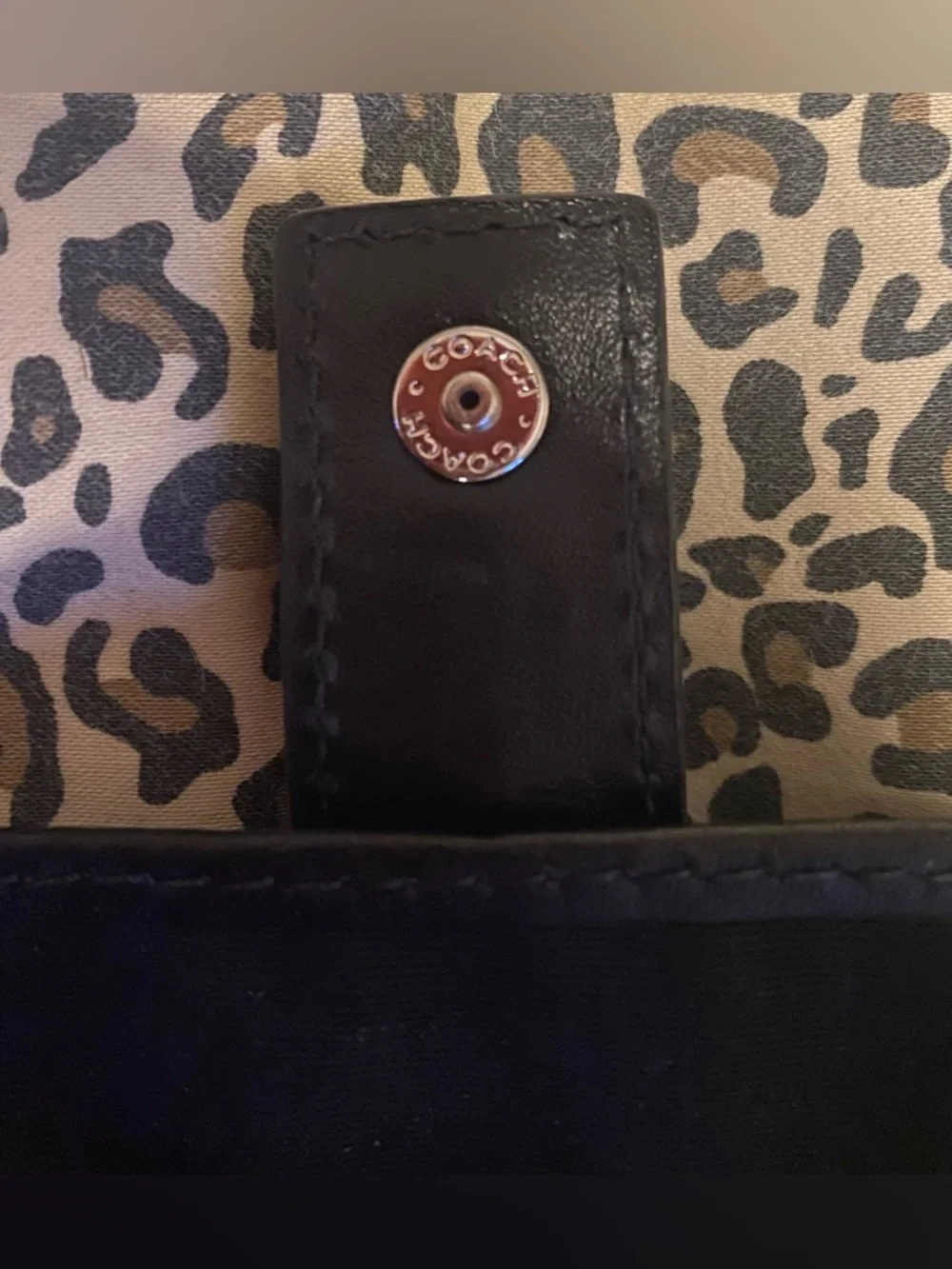 Coach Black Leather Wristlet Clutch with Buckle Accent